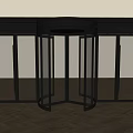 Modern Commercial Revolving Door Entrance With Glass Panels And Black Metal Frame