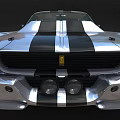 Vintage Silver Sports Car With Black White Stripes Front Grille And Yellow Emblem