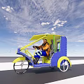 Yellow And Blue Electric Tricycle With Driver Riding On Road Under Blue Sky