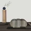 Soft Gray Sofa Stool With Draped Blanket And Wooden Pedestal On Area Rug