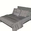 Modern Minimalist Gray Upholstered Double Bed with Soft Pillows and Cozy Blanket