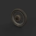 Worn Motorcycle Tire With Tread And Metal Rim On Dark Background