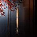 Modern Wall Lamp With Metal Bracket Mesh Shade Mounted On Dark Wall With Red Leaves