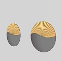 Modern Circular Wall Lamp with Black and Gold Design and Radiant Light Pattern on Wall