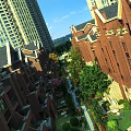 Residential Landscape Featuring Red Brick Townhouses High-Rise Buildings Green Trees Pathways and Courtyards