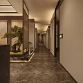 Elegant Traditional Hotel Lobby Interior With Cascading Water Screen Bonsai Tree And Reception Desk