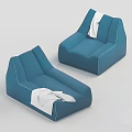 Two Blue Upholstered Casual Chairs With White Blankets In Modern Design