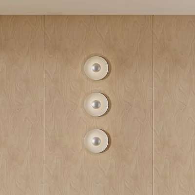 Three Modern Round Wall Lamps Mounted on Light Wood Grain Wall 3d model