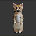 Orange And White Standing Cat Figurine With Big Eyes And Detailed Fur On Black Surface