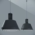 Two Modern Black Shade Pendant Lights Hanging From Ceiling With White Light