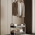 Modern Clothes Hanger with Lower Shelf Folded Towels and White Basket in Minimalist Interior