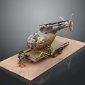 Military Helicopter Model Mounted On Trailer On Sand Ground With Equipment