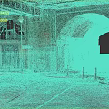 Arched Brick Underpass Area With Metal Fences Street Lamp And Curved Paved Road