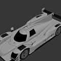 Silver Prototype Racing Car With Streamlined Body Rear Wing And Sporty Design