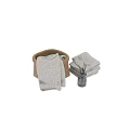 Soft White Towels In Wicker Storage Baskets With Aromatherapy Diffuser