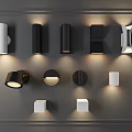 Modern Wall Lamps With Various Black And White Designs Mounted On Gray Wall