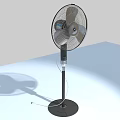 Standing Air Cooler Fan With Black Base Silver Blades Electric Cord On Light Surface