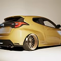 Golden Toyota Sporty Hatchback With Black Grille And Alloy Wheels