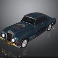 Blue Vintage Classic Car With Emblem Round Headlights And Silver Wheels