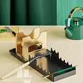 Elegant Golden Knife Holder with Black Tray and Green Teapot Kitchen Tools