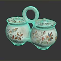 Pair of Decorative Ceramic Containers With Floral Patterns And Orange Rimmed Lids