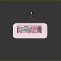 Stylish Pink And White Wired Computer Keyboard On White Desk Pad For Office Use