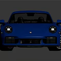Blue Sports Car Featuring Streamlined Design And Shiny Alloy Wheels On Reflective Surface