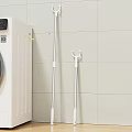Clean White Washing Machine In Laundry Space With Mop And Hanger On Tile Wall