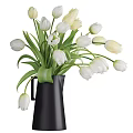 Fresh White Tulips In Black Vase With Green Leaves For Home Decor