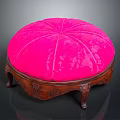 Round Bright Pink Velvet Footstool With Carved Wooden Legs And Classic Design