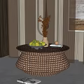 Elegant Round Wicker Coffee Table with Glass Top Fruits Vase Dried Plants and Books