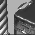 Two Black Textured Surface Luggage Pieces With Wheels And Different Sizes 3d model