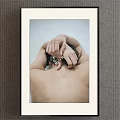 Portrait Painting Back Hands Clasped Behind Head Flower Ring Light Brown Frame Gray Wall