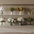 Decorative Ornament Arrangement With Glass Vases And Mixed Flower Bouquets On Shelf