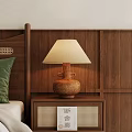 Natural Wooden Nightstand With Light Colored Lampshade Green Pillow By Wooden Wall
