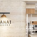 Modern Dessert Shop Interior With Cashier Counter Wooden Shelves And Rock Decor
