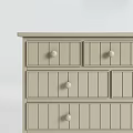 Light Colored Wooden Chest of Drawers with Multiple Drawers and Round Knobs 3d model