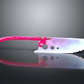 Decorative Red Handle Knife With Purple Pink Gradient Blade Circular Holes On Black Smooth Surface