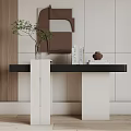 Modern Console Table with Green Plant Vase Books and Decor on Light Colored Wall