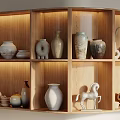 Ceramic Vessels Display On Wooden Shelf With Various Shapes And Decorative Pieces
