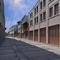 Traditional Style Commercial Street with Gray Buildings Wooden Doors and Stone Pavement