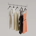 Colorful Dresses Hanging On Metal Rod With Different Styles And Hangers