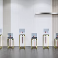 Modern Glass Display Shelves With Red Items In Interior Setting With Hanging Lights