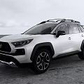 White Toyota SUV With Roof Rack Black Wheels And Off Road Style In Outdoor Setting