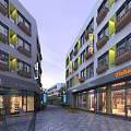 Modern Pedestrian Commercial Street With Shops Balconies Store Signs And Stone Pavement
