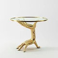 Golden Coffee Table With Artistic Hand Shaped Base And Glass Top