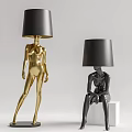 Human Shaped Floor Lamps Gold Standing And Black Seated Figure Design