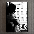 Portrait Silhouette of a Woman in Elegant Robe by Window With Parisian Building Background Black and White