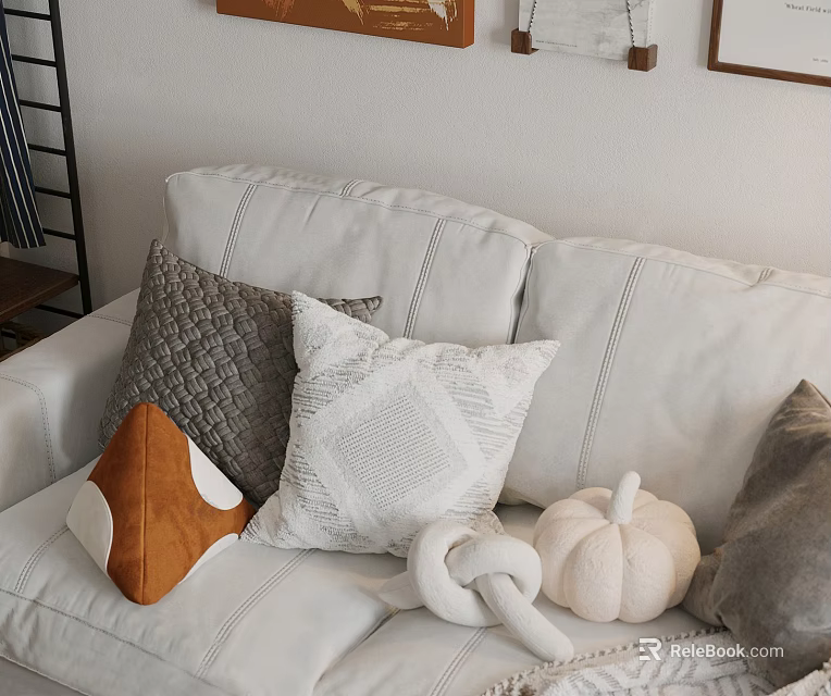 Cozy Textured Pillows On White Sofa With Orange Accent And Decorative Pumpkin 3d model 