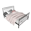Stylish Double Bed With Black Metal Frame And Pink Comforter Pillows